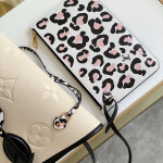 Louis Vuitton Neverfull MM Monogram Empreinte Leather Bag Creme