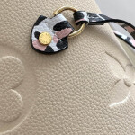 Louis Vuitton Neverfull MM Monogram Empreinte Leather Bag Creme