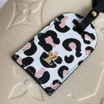 Louis Vuitton Neverfull MM Monogram Empreinte Leather Bag Creme